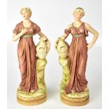 ROYAL DUX; a pair of figures of female water carriers,