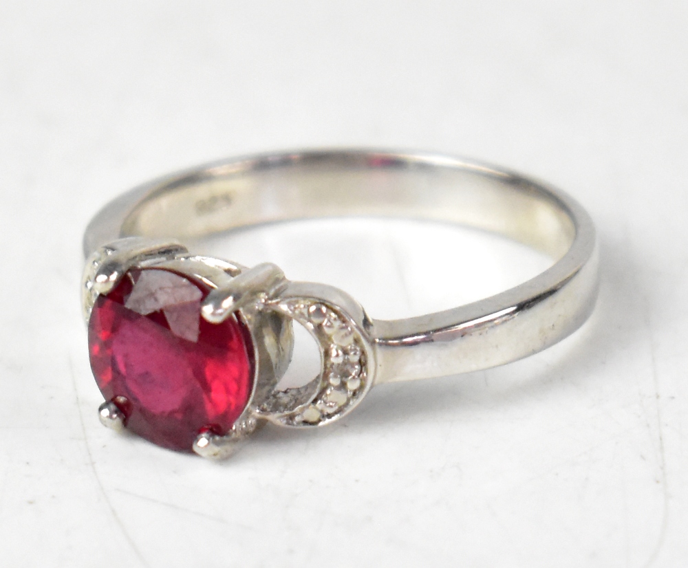 Five hallmarked sterling silver rings, comprising a ruby, sapphire and diamond ring, - Image 3 of 6