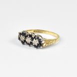 A 9ct gold diamond and sapphire ring,
