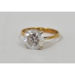 An 18ct gold white stone solitaire ring,