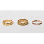 Three 9ct gold rings, comprising two yel