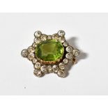 A 19th century yellow metal, diamond and peridot brooch,