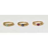 Three similar 9ct gold fashion rings, on