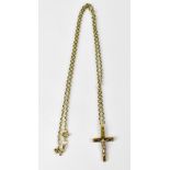 A 9ct yellow gold crucifix and a 9ct yel
