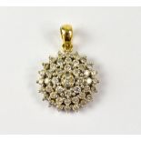 An 18ct yellow gold floral set diamond p