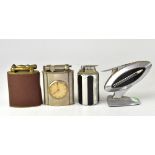 Four vintage table lighters including a T-21 Robin, a table lighter by Maruman,