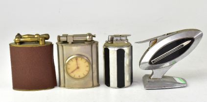 Four vintage table lighters including a T-21 Robin, a table lighter by Maruman,