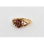 A 9ct gold garnet cluster ring with cent