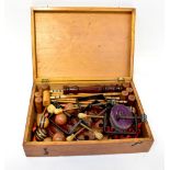 A wooden cased set of vintage pub/bar cr