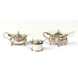 A George V hallmarked silver miniature drum lidded mustard with blue glass liner,