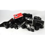 A metal camera case and eight assorted S