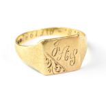 A 9ct yellow gold signet ring engraved '