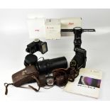 A collection of camera accessories inclu