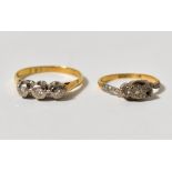 An 18ct gold and platinum ring with thre
