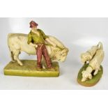 ROYAL DUX; two large porcelain figures, a farmhand with bull,