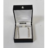 A pair of two-tone 9ct gold diamond inse