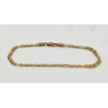 A 9ct gold fancy link bracelet with lobs