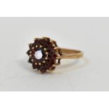 A 9ct gold garnet cluster ring with cent