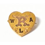 An Edwardian 9ct gold heart-shaped brooc