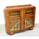 An Art Deco style walnut display cabinet