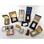 A collection of various vintage lighters