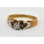 An 18ct gold ring with tiny illusion set