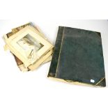 A large cloth bound album containing pri