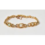 A 15ct gold opal and diamond bracelet,