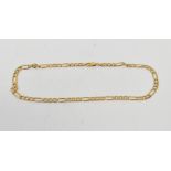 A 14ct gold flat link Figaro necklace wi