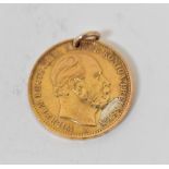 A Wilhelm 1875 gold twenty mark coin (.9