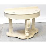 A white painted demi-lune console table