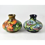 MOORCROFT; two squat baluster vases, 'Fl