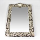 An Edwardian ornate table mirror with a