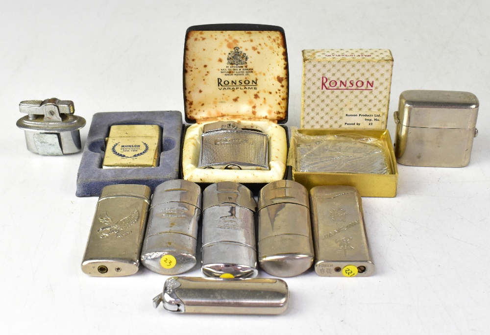 Eleven vintage lighters, three Ronson ex