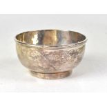 WITHDRAWN A George III hallmarked silver bowl with folded rim, raised on small foot rim,