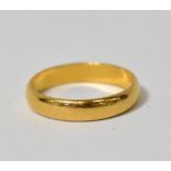 A 22ct gold band ring, size L, approx 2.