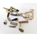 A quantity of whistles, including duck,