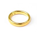 A 22ct yellow gold wedding band, size J,