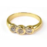 A 9ct yellow gold dress ring with three