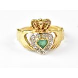 A 9ct yellow gold ring set with heart-sh