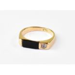 A 14ct yellow gold pinky ring with recta