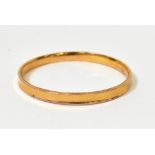 A 9ct yellow gold bangle, the hollow tub