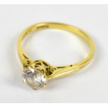 A 14ct yellow gold ring set with a solit