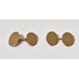A pair of 1930s 9ct gold oval cufflinks,