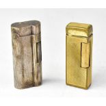 DUNHILL; two lighters comprising a yello