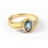 A 9cy yellow gold dress ring with pear-s
