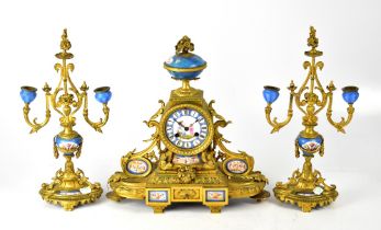 A 19th century gilt brass clock garniture with floral decoration on a blue ground,