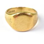 A 9ct yellow gold signet ring, size V, a