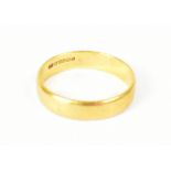 A 22ct yellow gold wedding band, size L,