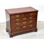 An early 19th century mahogany chest dra